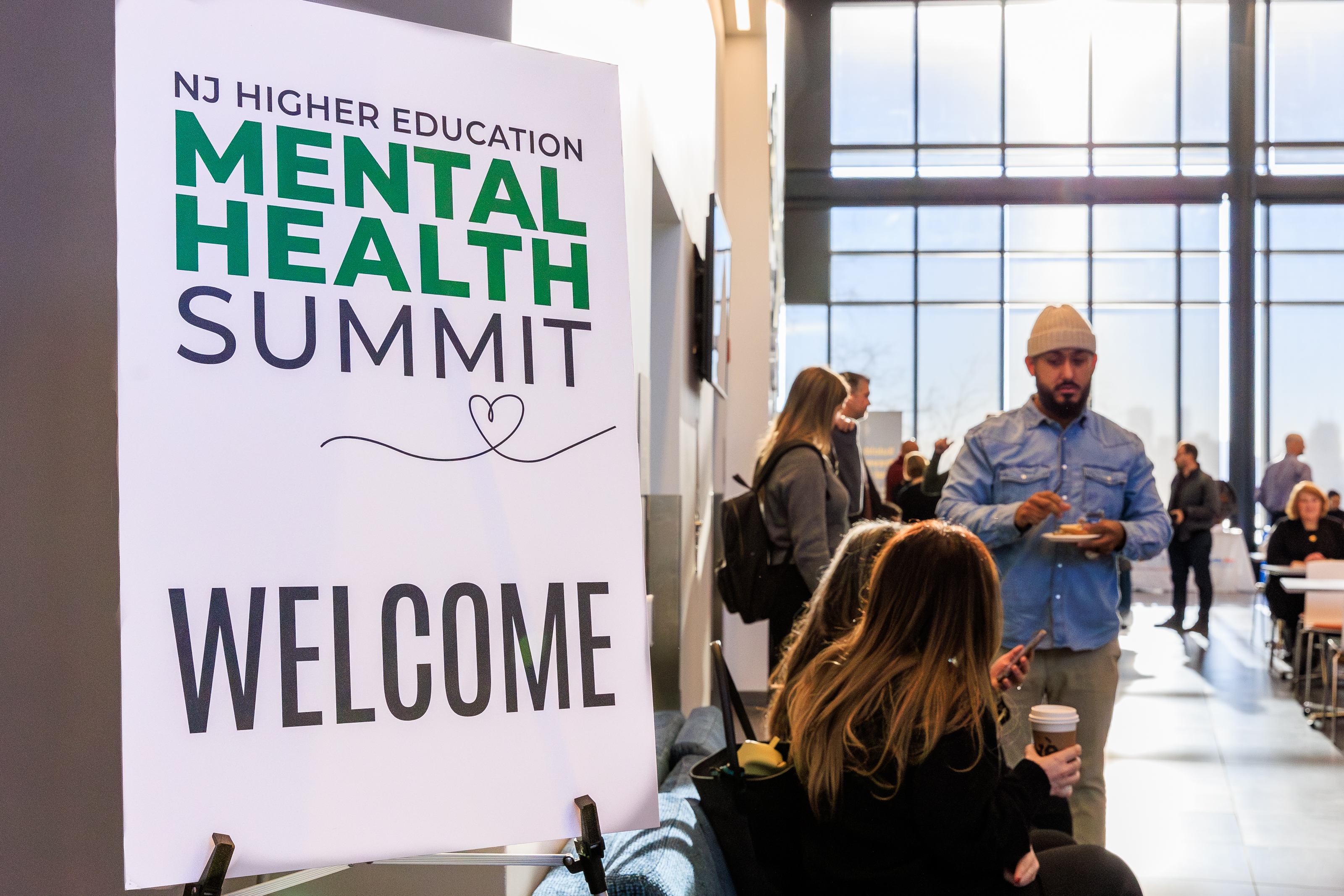 An image of the welcome desk for the NJ Higher Education Mental Health Summit at Stevens