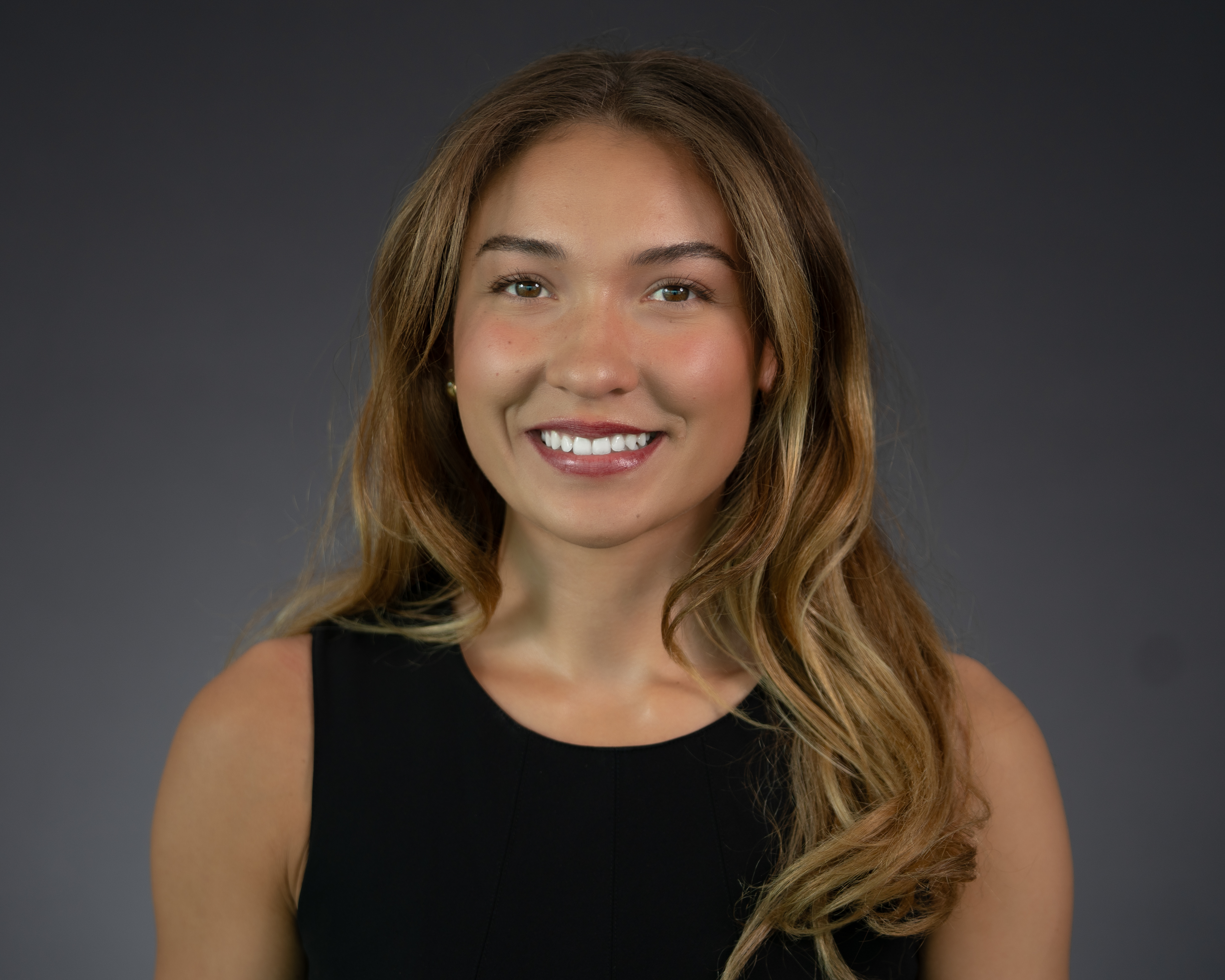Headshot of Quincy Connell wearing professional attire.