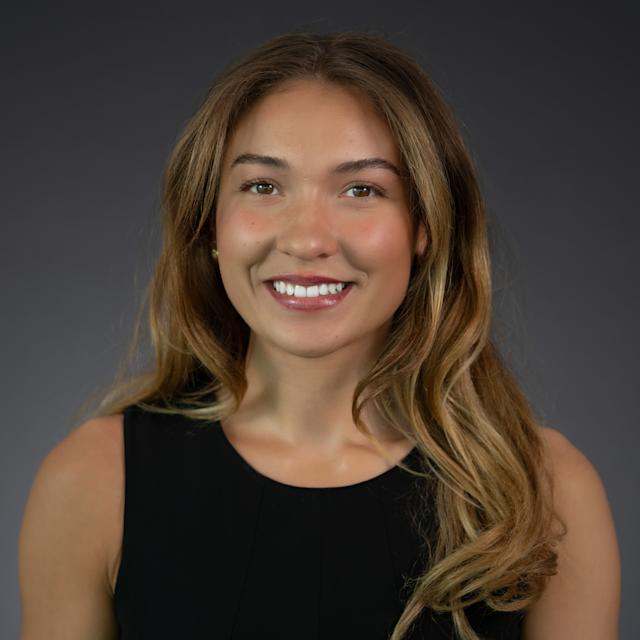 Headshot of Quincy Connell wearing professional attire.