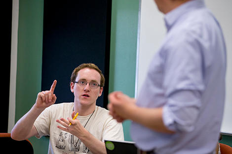 A student responding to a professor's question