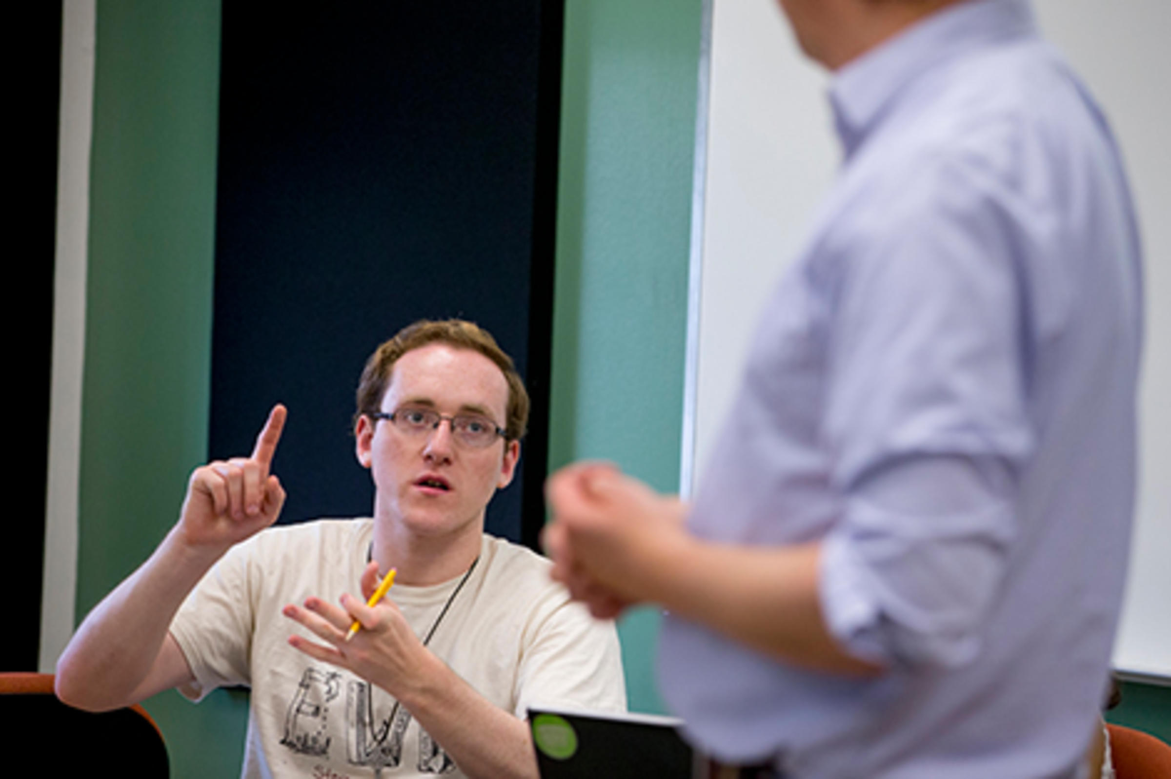 A student responding to a professor's question