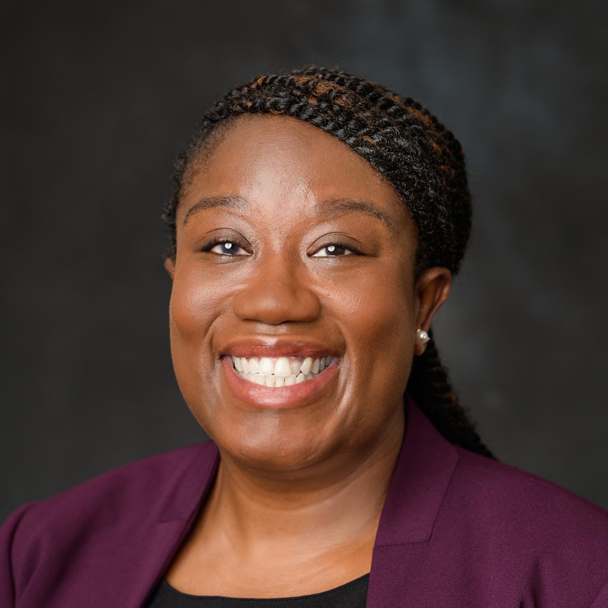 Portrait photo of Edlyn Thompson-Mettle