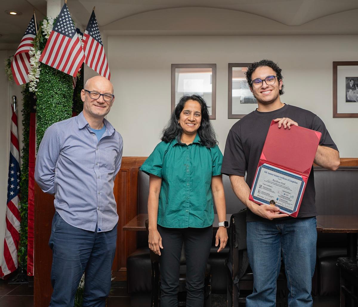 Marcin Iwanicki (left), Sesha Sridevi Alluri (center) and AiBC Student Scholar Kyriloss Gad (right).