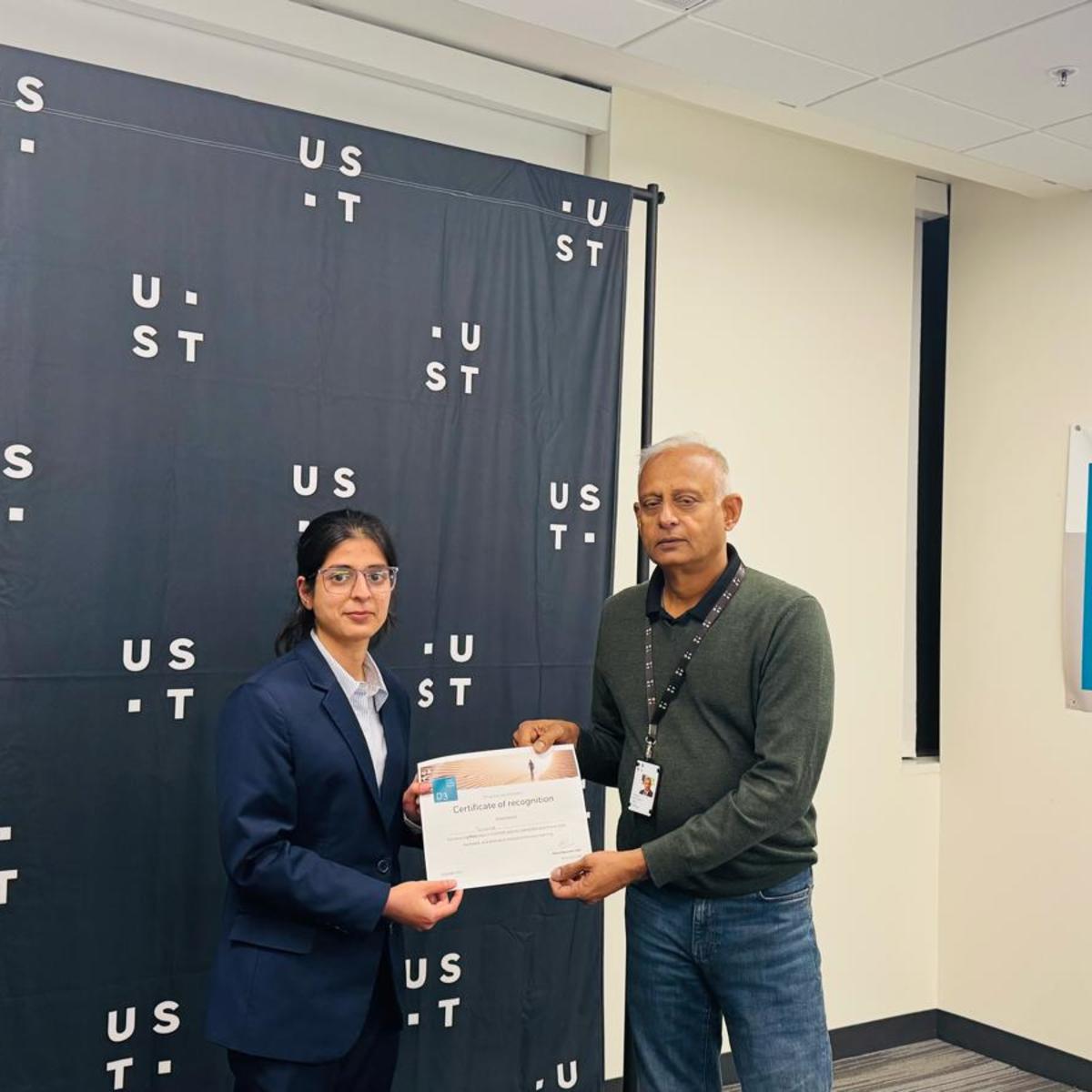 Vandna Rajpal ’25 receives Certification of Recognition from Niranjan Ramsunder, Chief Technology Officer, UST.