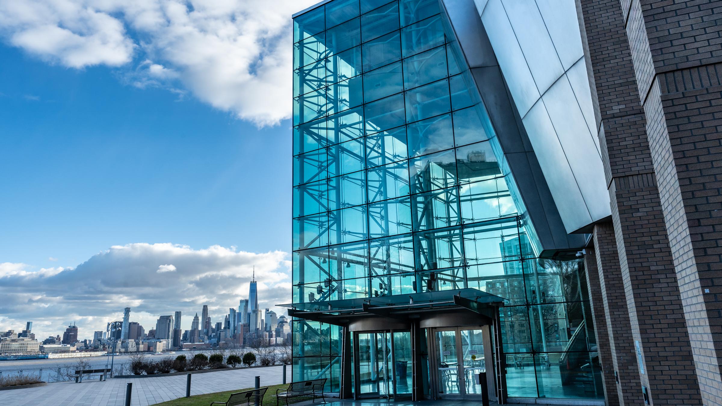Babbio Center with the New York City skyline to the left in the background.