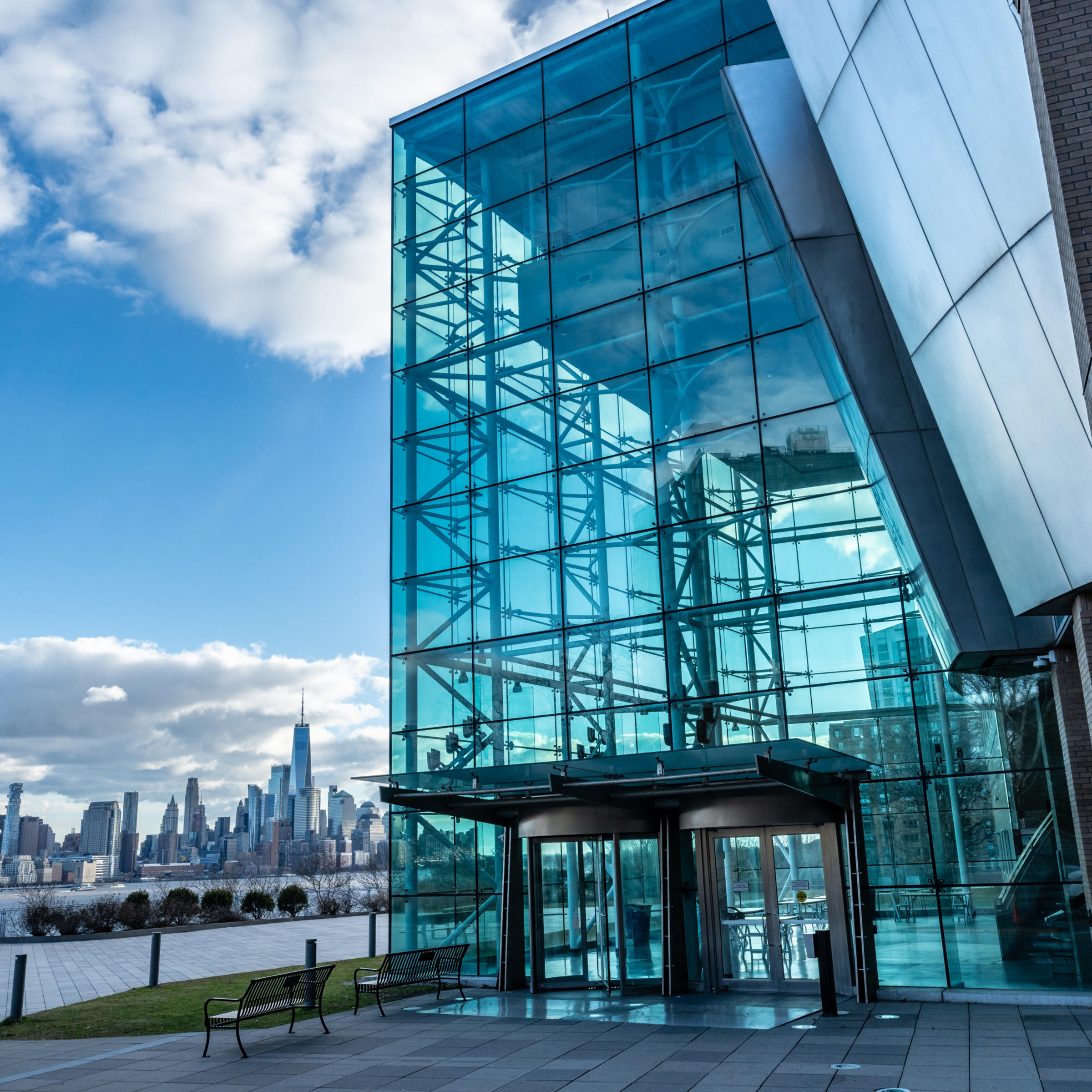 Babbio Center with the New York City skyline to the left in the background.