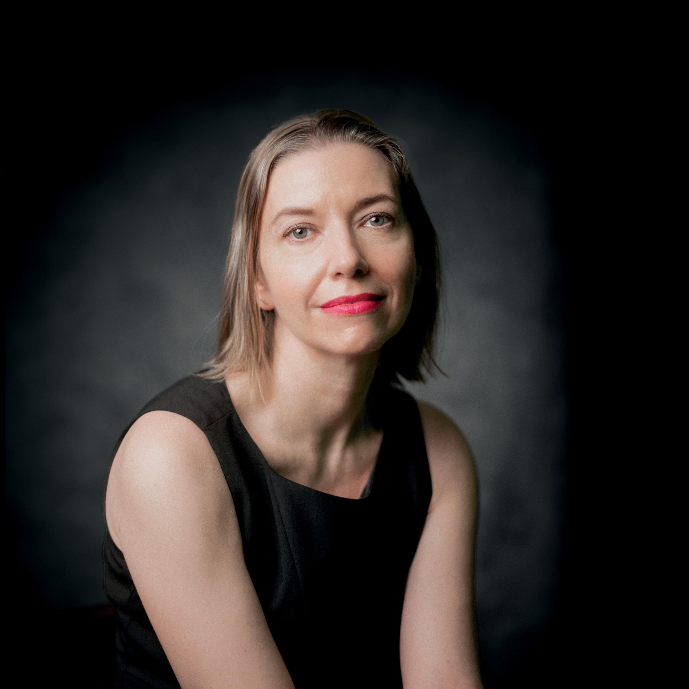 Portrait of Theresa MacPhail with plant