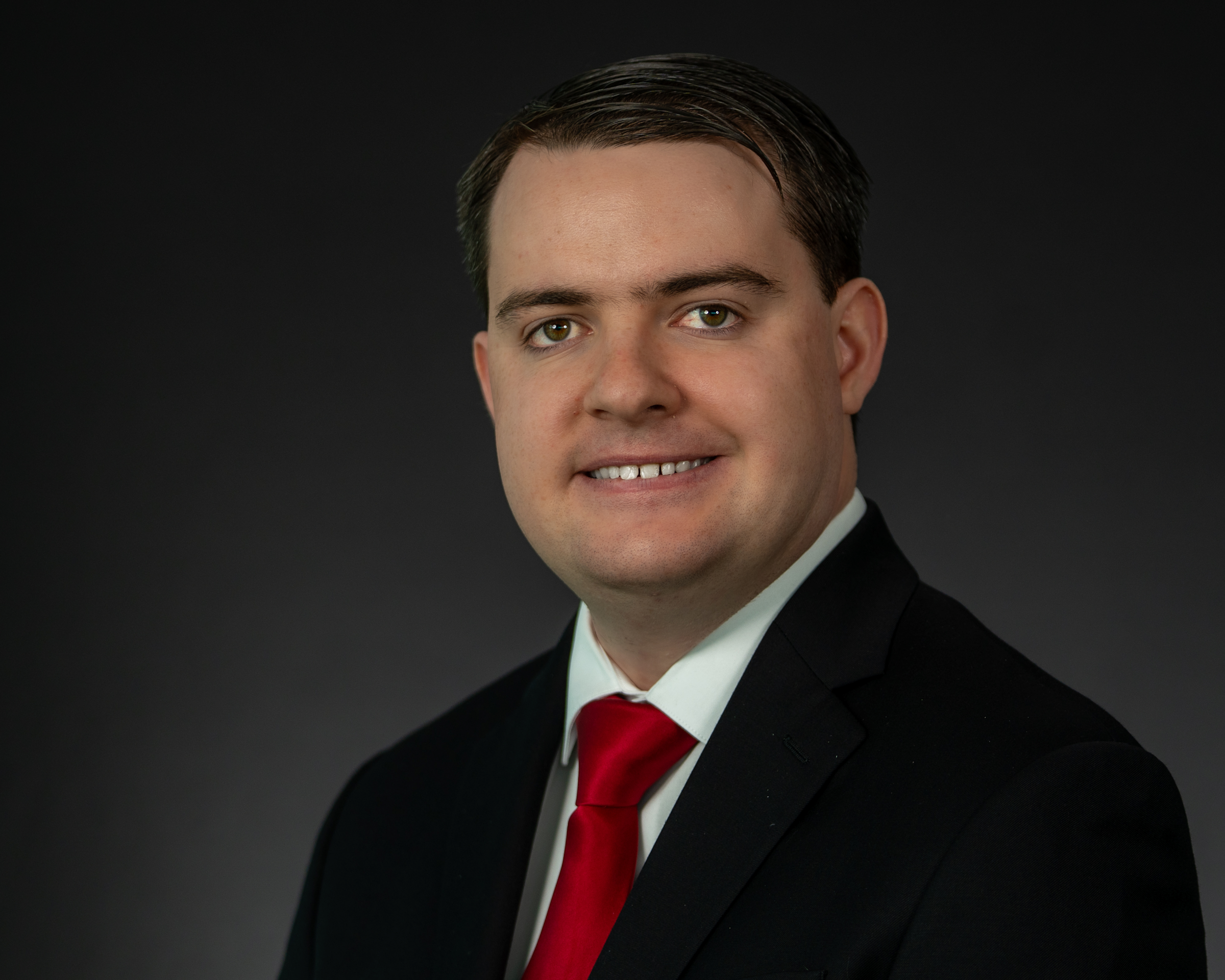 Headshot of Robert Dahill wearing professional attire.