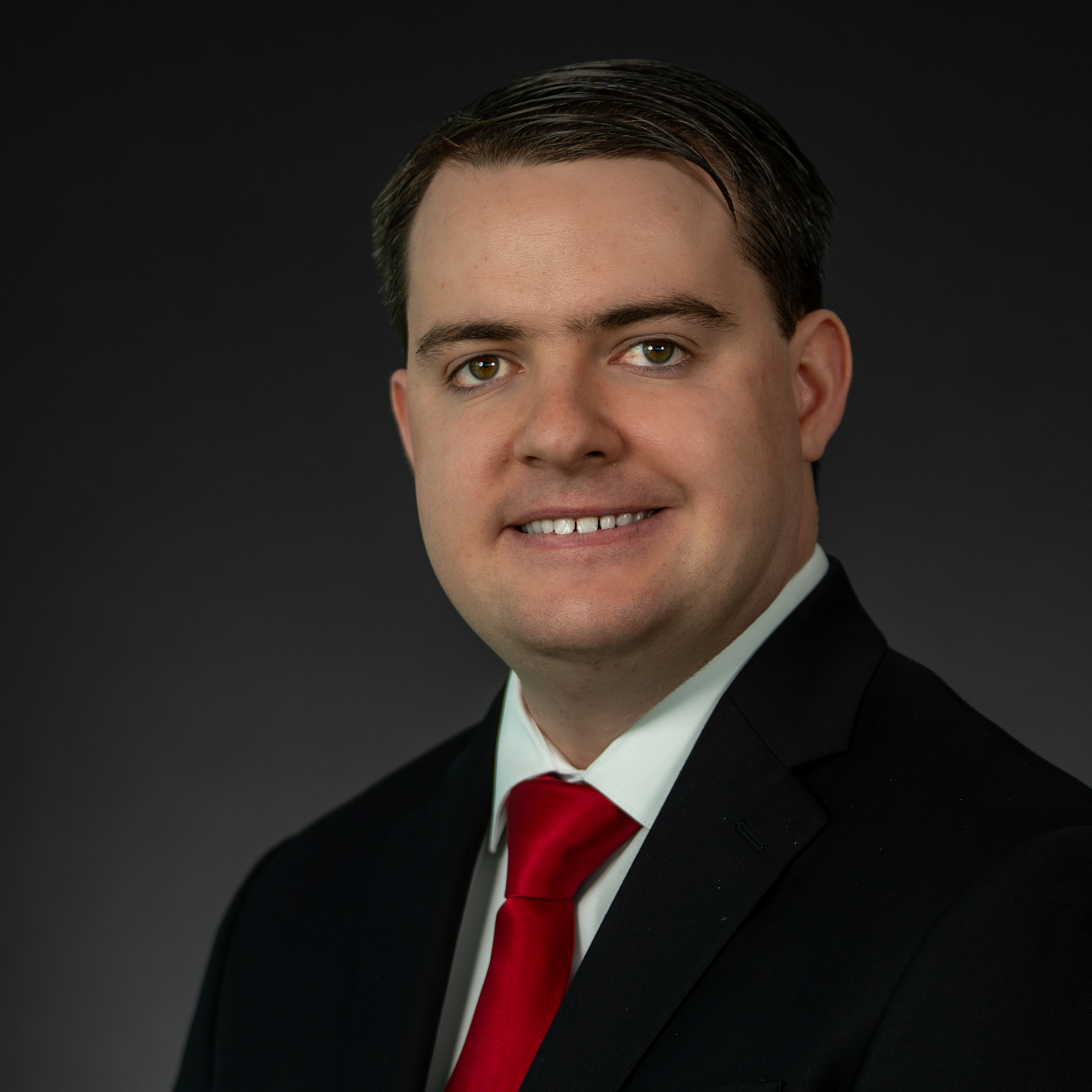 Headshot of Robert Dahill wearing professional attire.