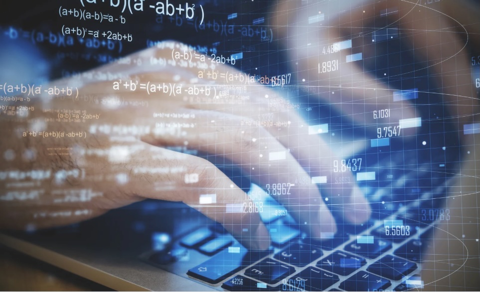 Hands on a laptop with forex chart and mathematical formulas