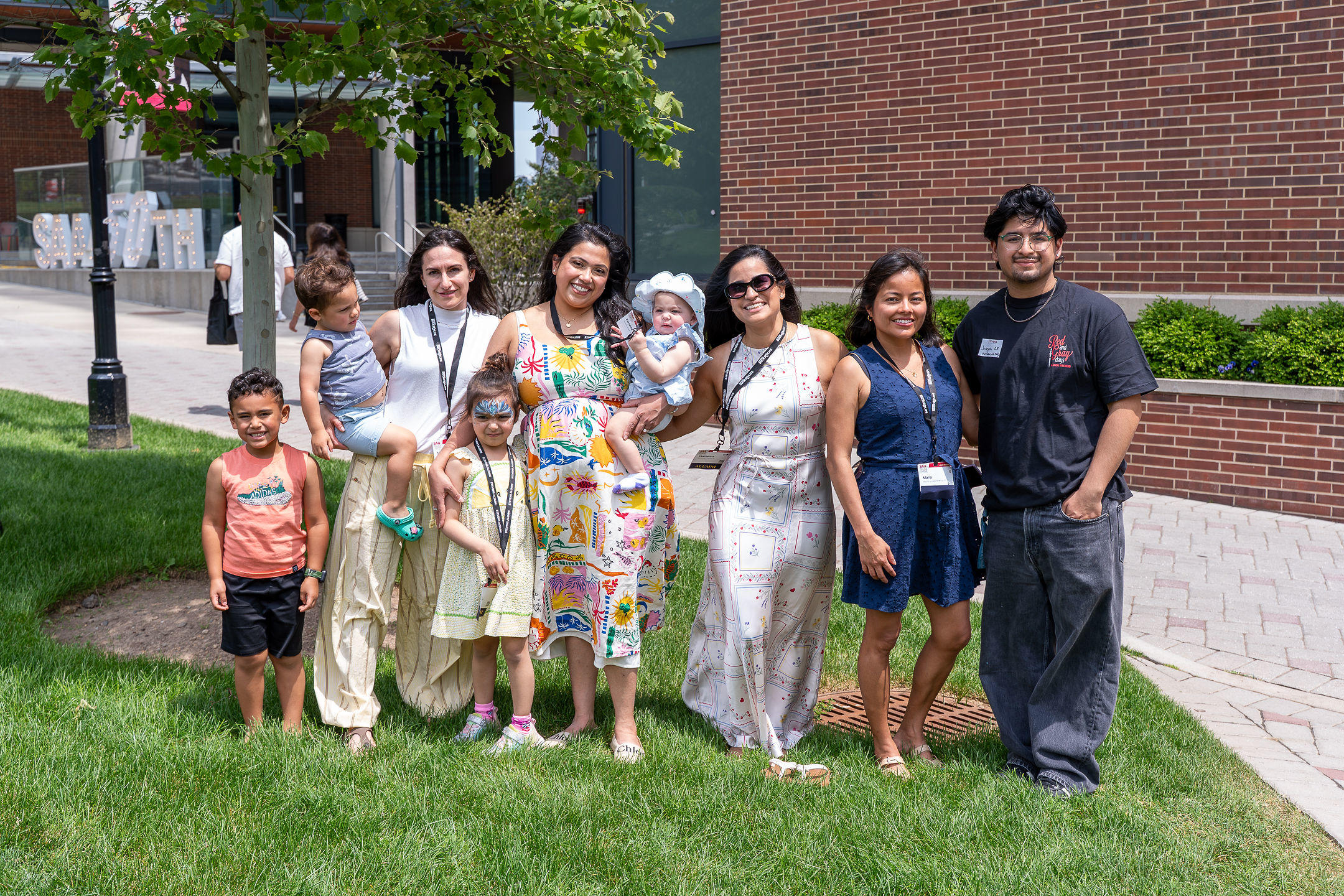 Group of alumni and family members outside on campus at Alumni Weekend 2026