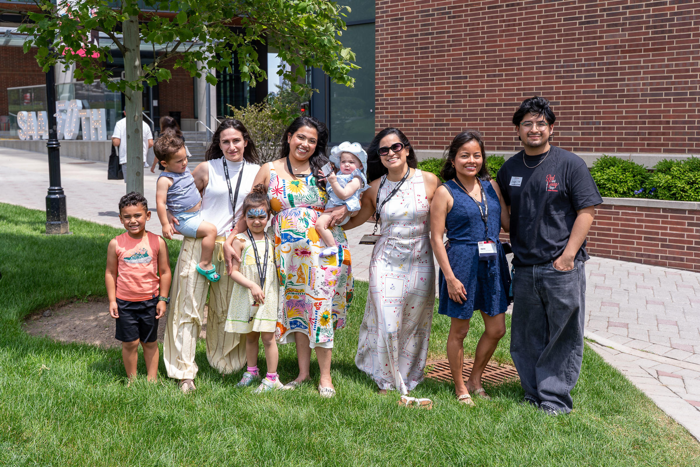 Group of alumni and family members outside on campus at Alumni Weekend 2026