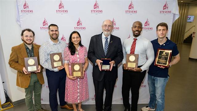 The SAA award recipients pose with their awards at Alumni Weekend 2025