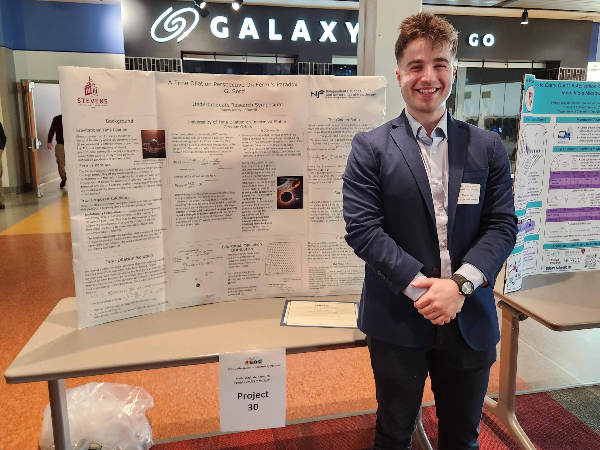 Gabriel Sorci ’25 with his research poster at ICUNJ 2023