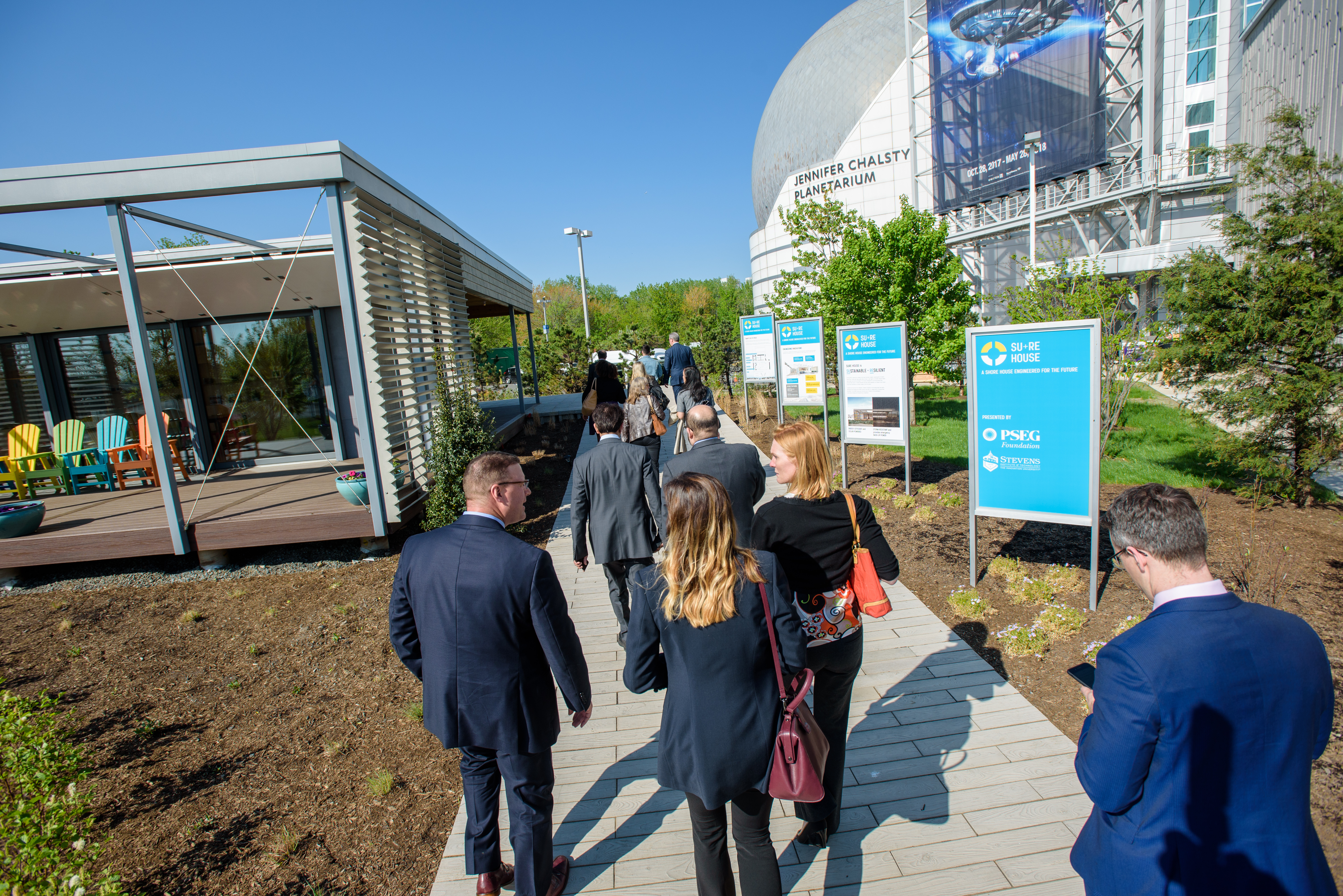 Group of professionals walking at event