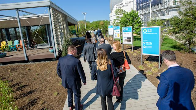 Group of professionals walking at event