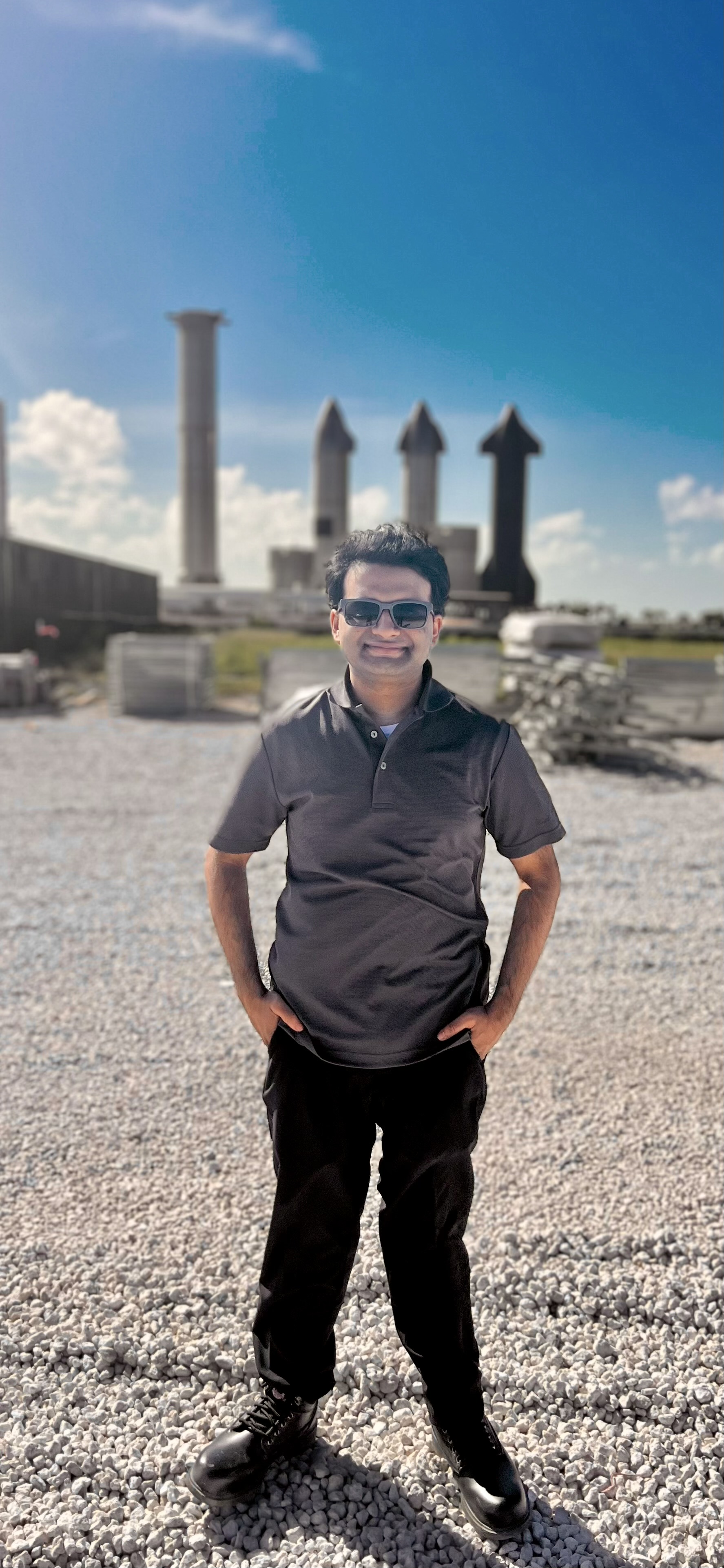 Arjun Krishna poses in front of rockets