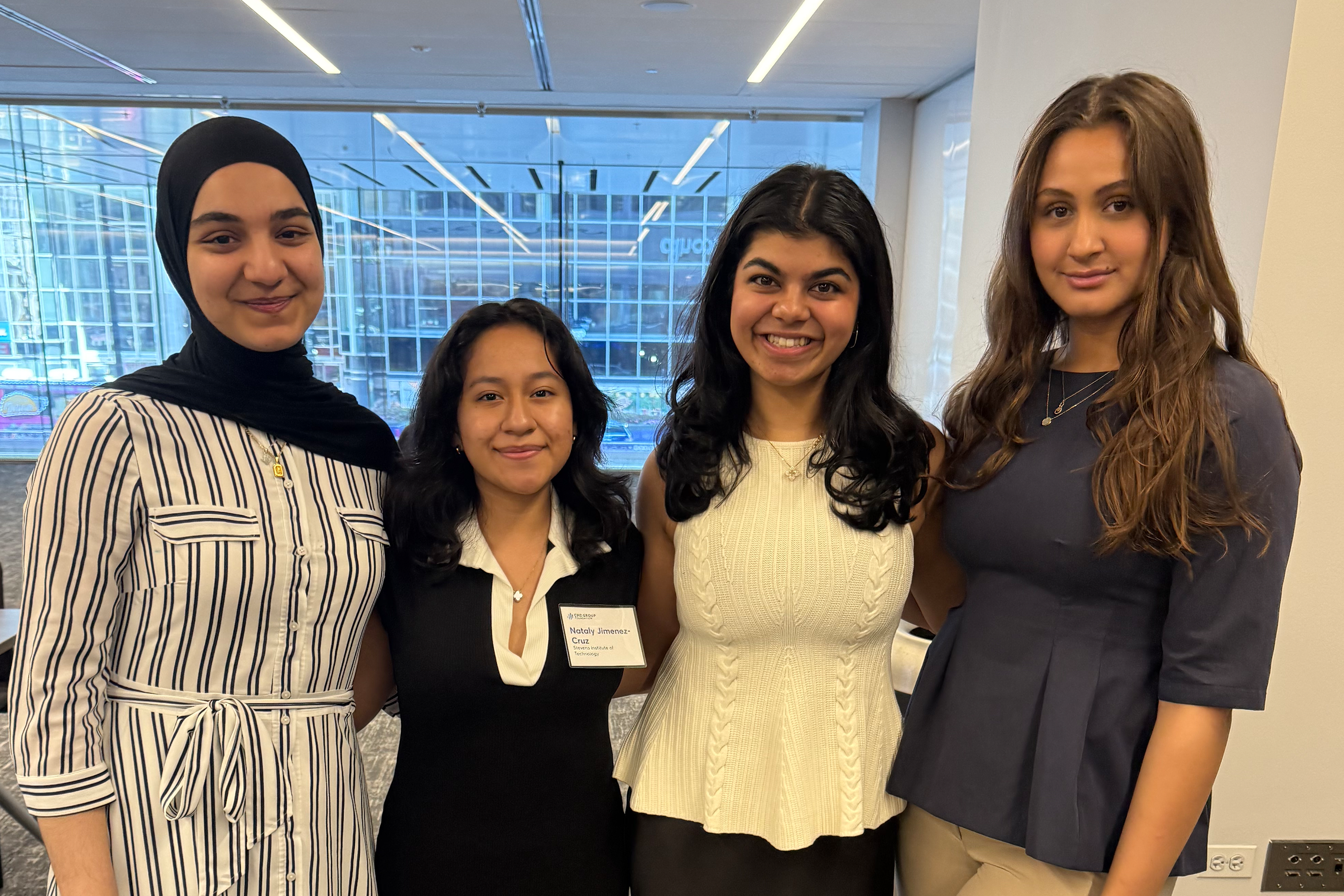 2024 recipient Aylin Erdal and 2023 recipient Nataly Jimenez-Cruz stand to the left of 2025 recipients Muskaan Thapar and Melise Sever 