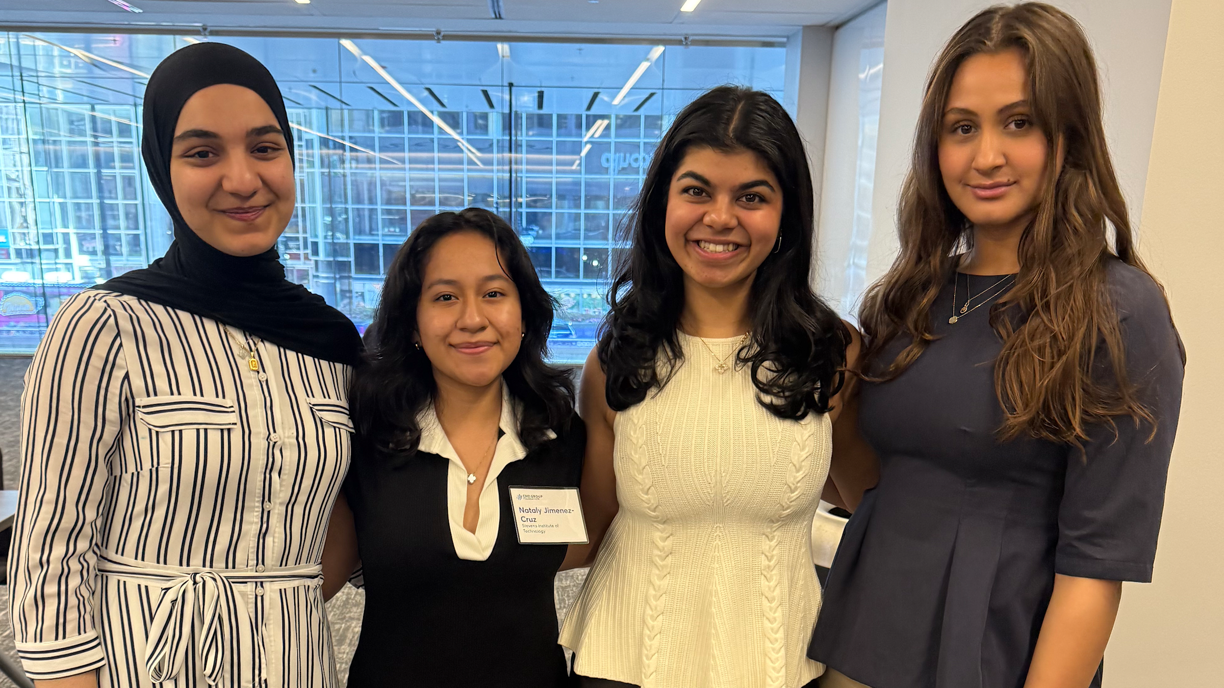 2024 recipient Aylin Erdal and 2023 recipient Nataly Jimenez-Cruz stand to the left of 2025 recipients Muskaan Thapar and Melise Sever