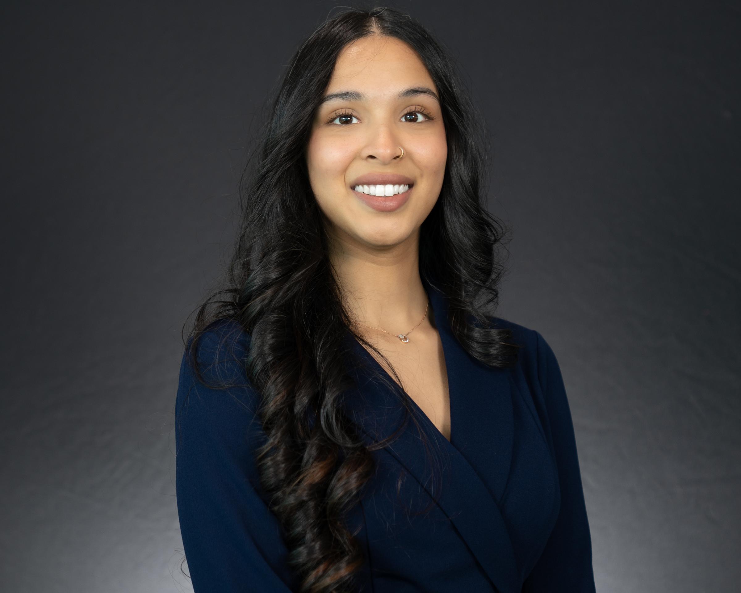 Headshot of Sofia Udaipurwala wearing professional attire