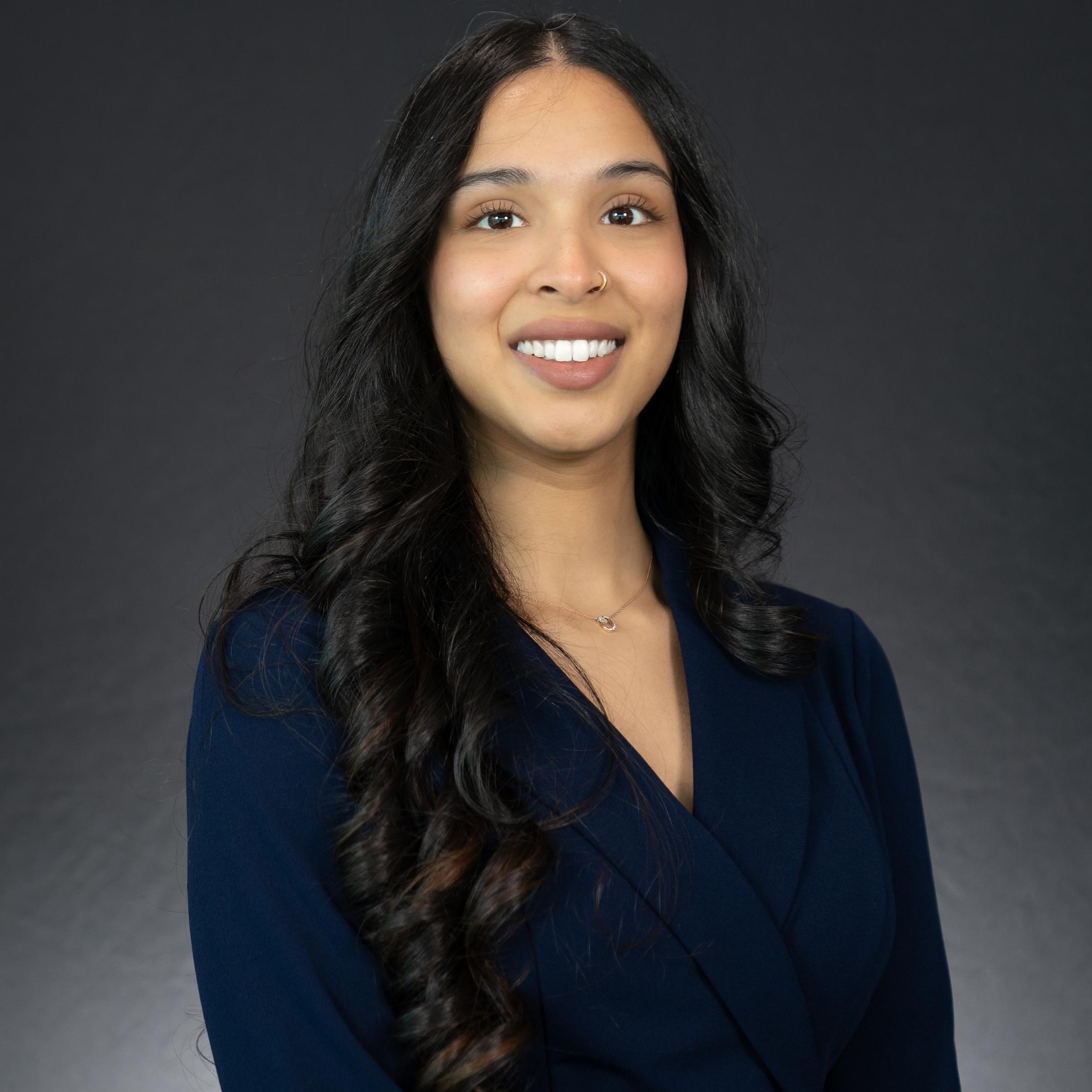 Headshot of Sofia Udaipurwala wearing professional attire