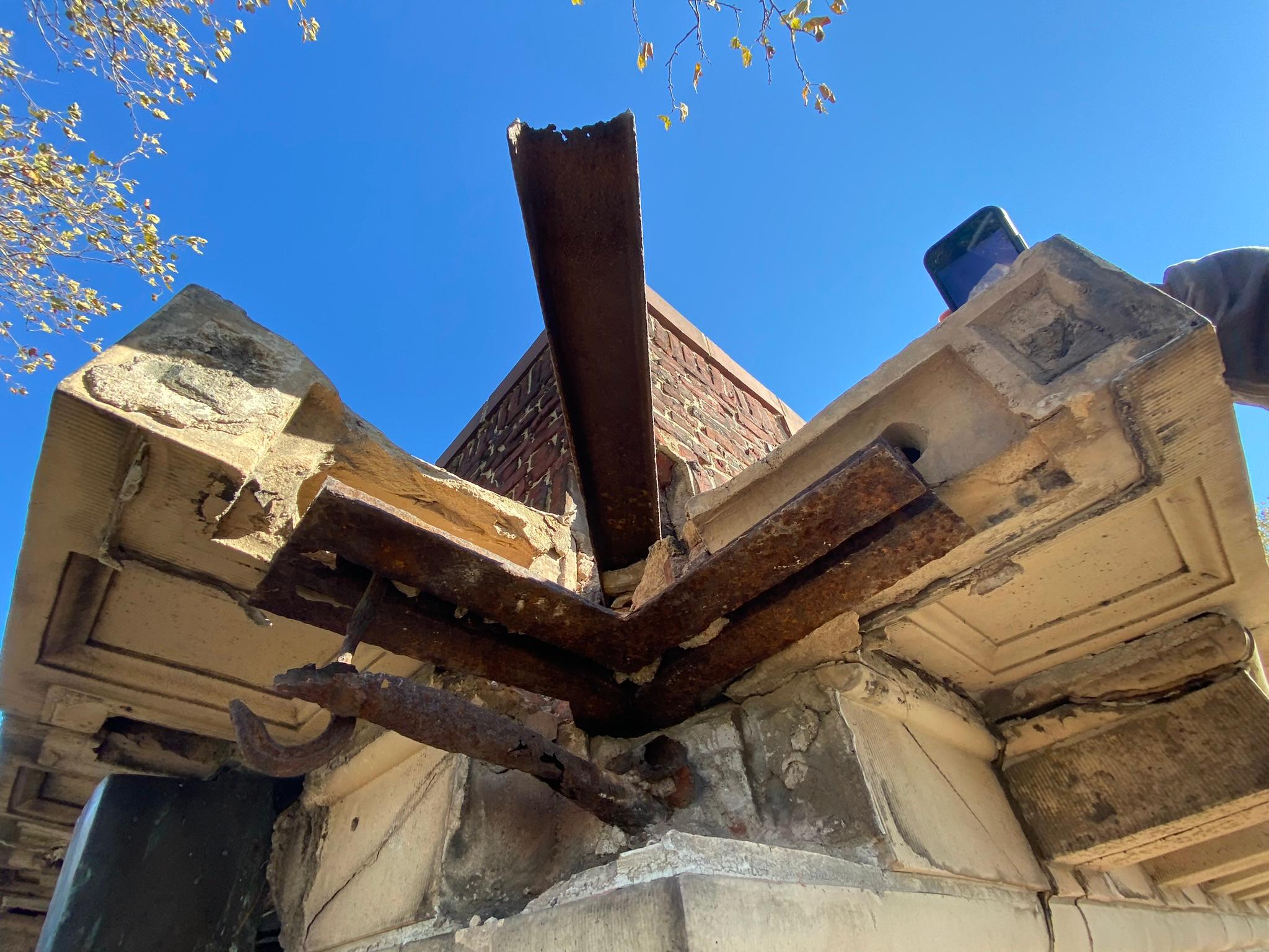 Cornice reconstruction at southwest corner, before restoration