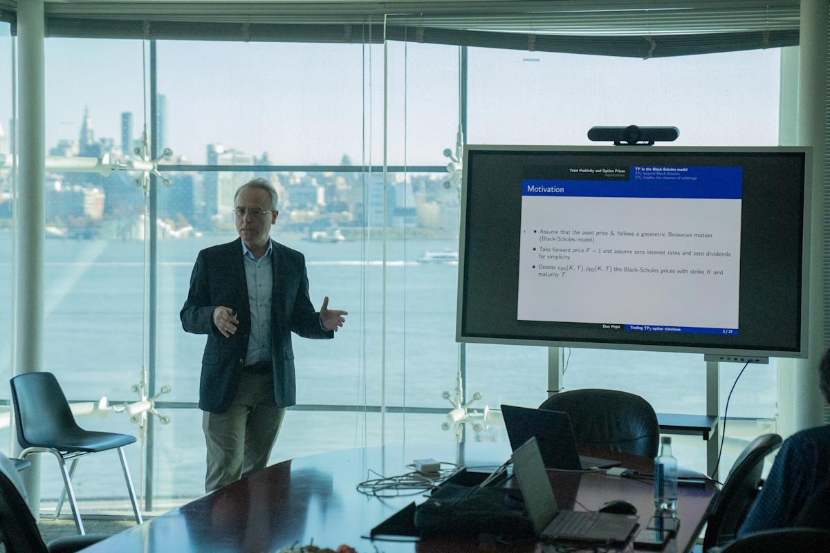 Dan Pirjol presents his research