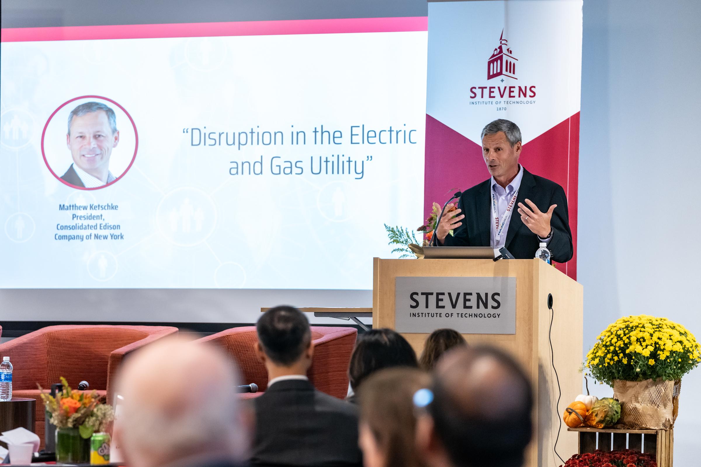 Matthew Ketschke stands behind a podium to address the 2023 MAACBA Conference.