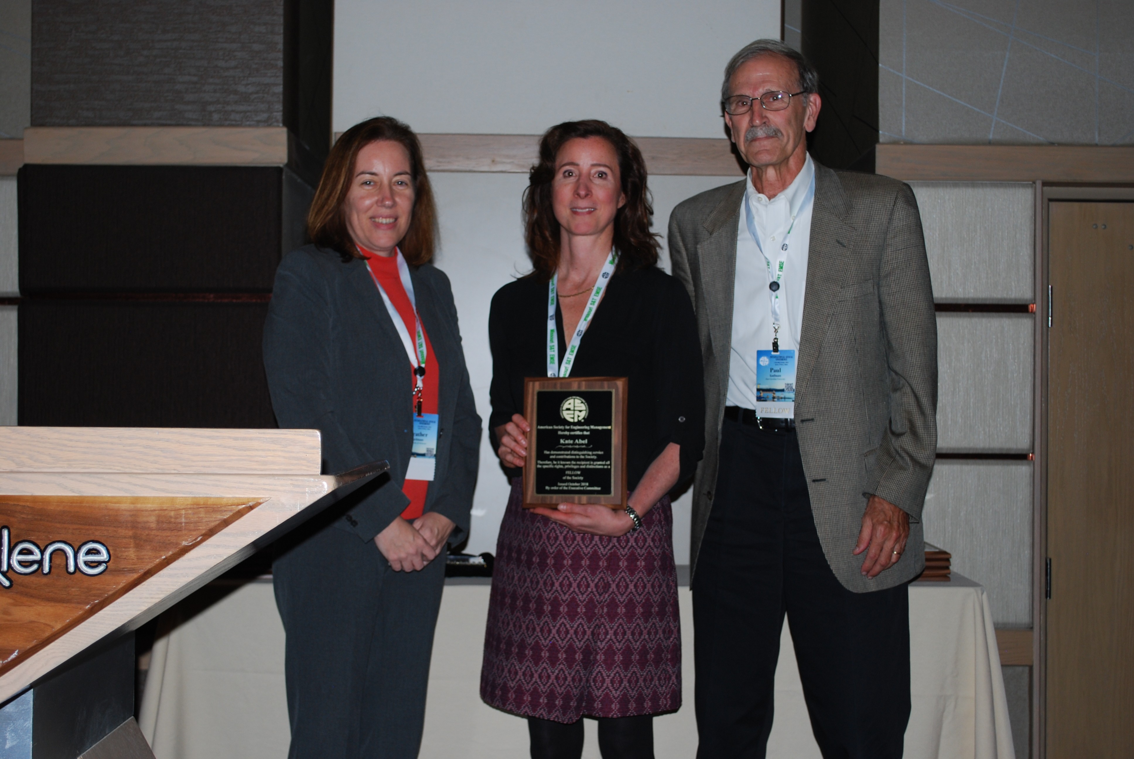 Photo of Kathryn Abel receiving her fellowship from ASEM.