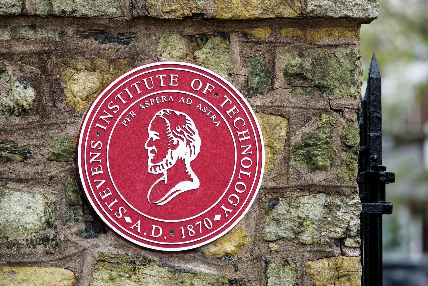 Stevens seal outside the entrance to campus