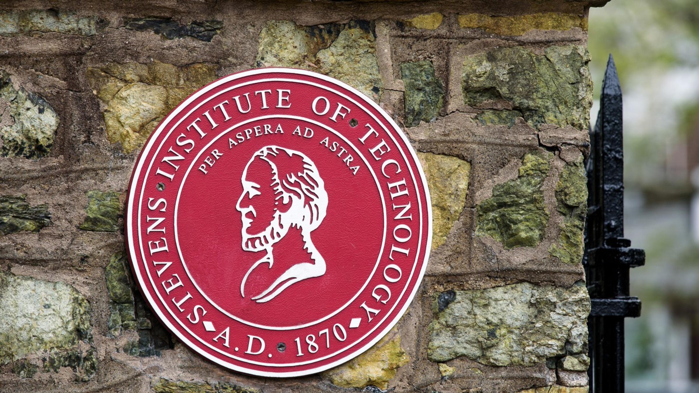 Stevens seal outside the entrance to campus