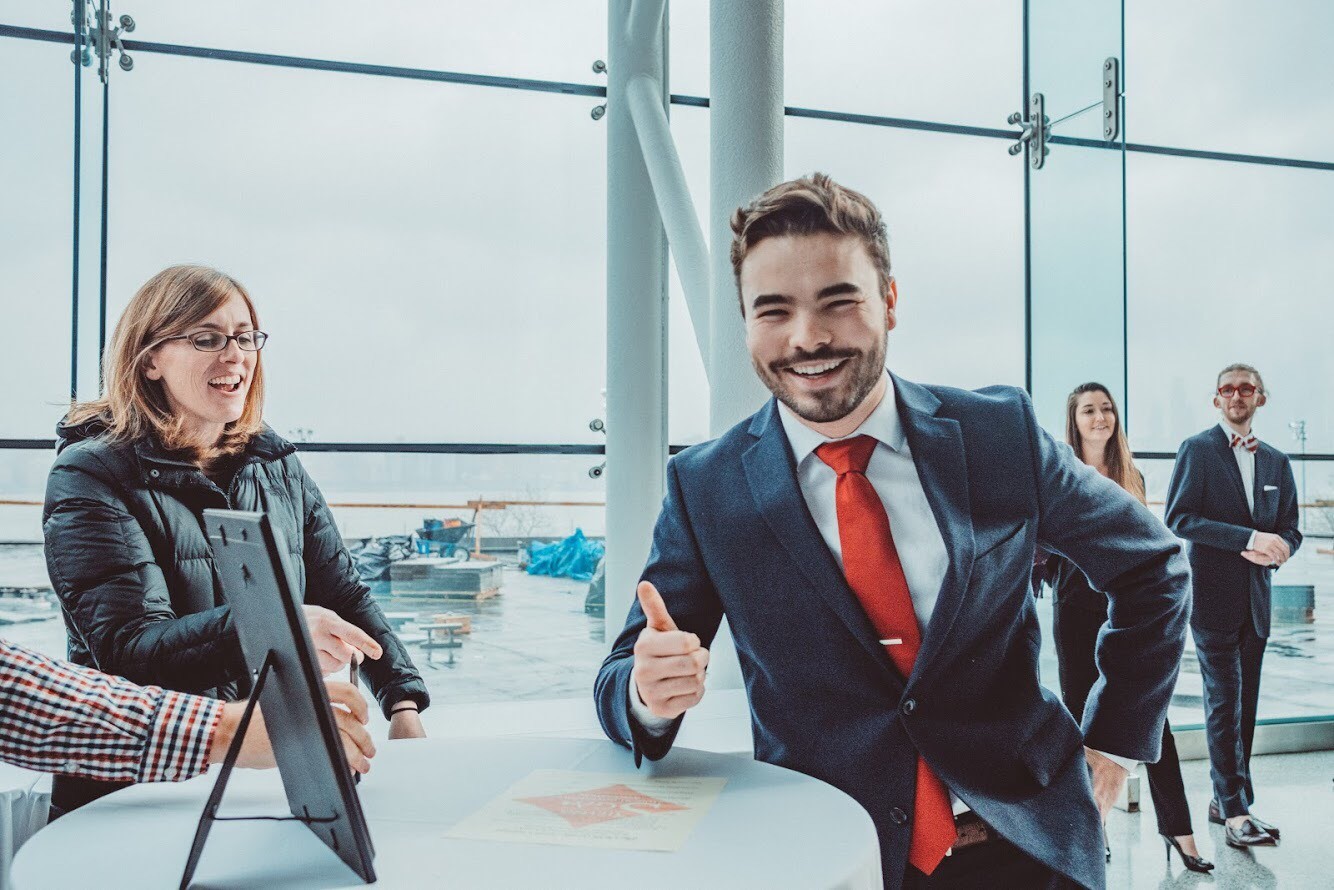 Inside the Babbio Center at Stevens, Lucas Gallo signs the oath of office to become the president of the Student Government Association