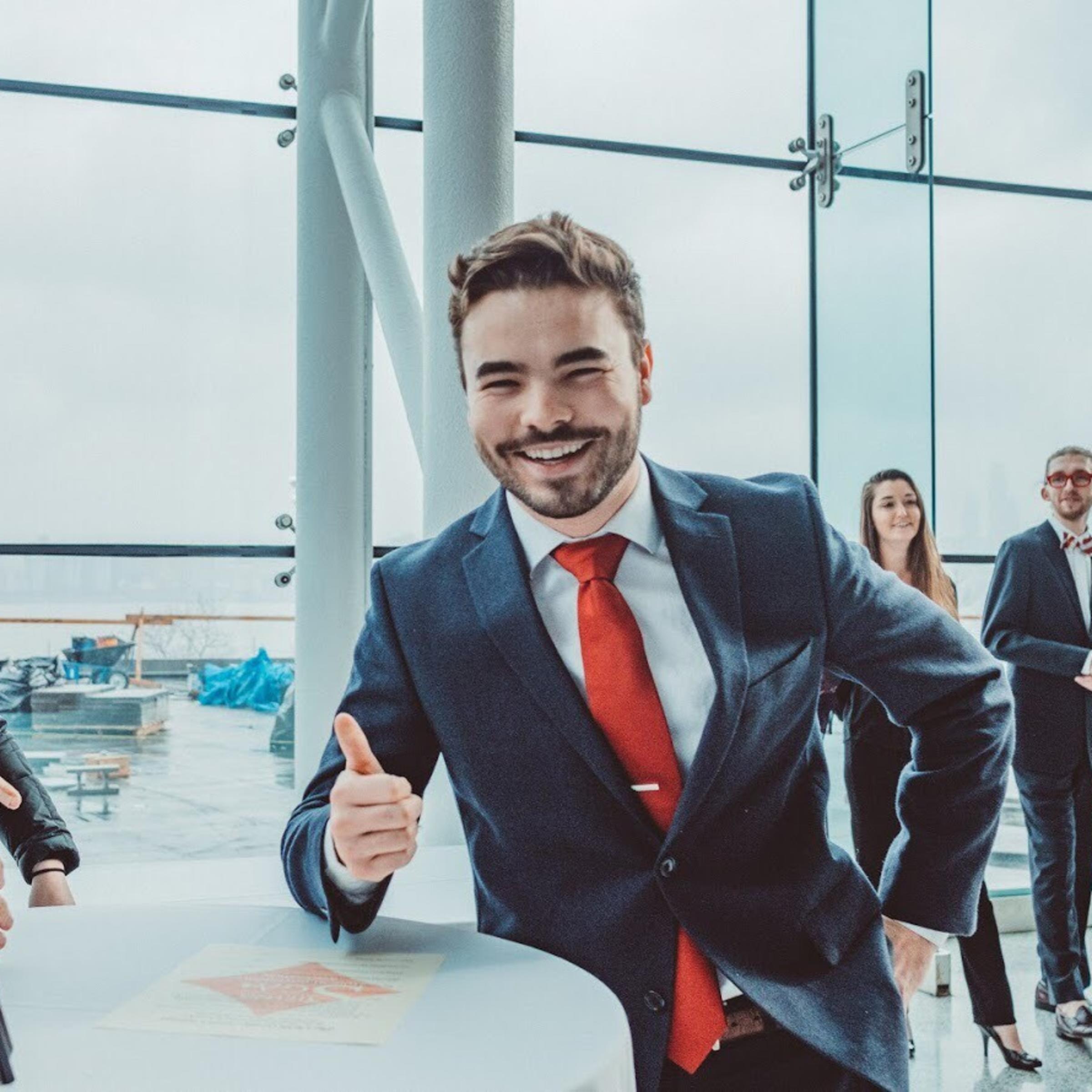 Inside the Babbio Center at Stevens, Lucas Gallo signs the oath of office to become the president of the Student Government Association