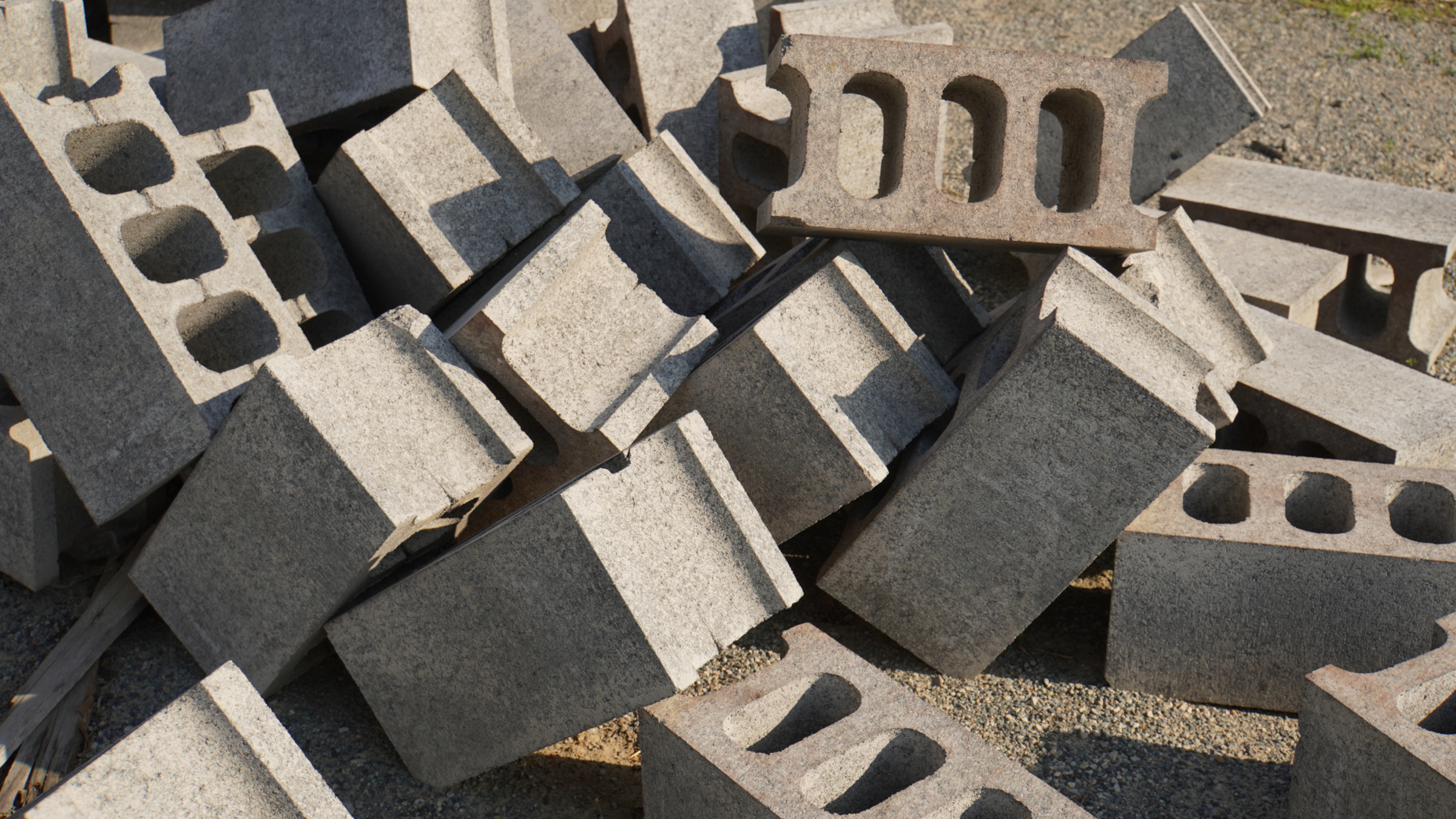 A stock image of multiple concrete blocks stacked on top of each other.