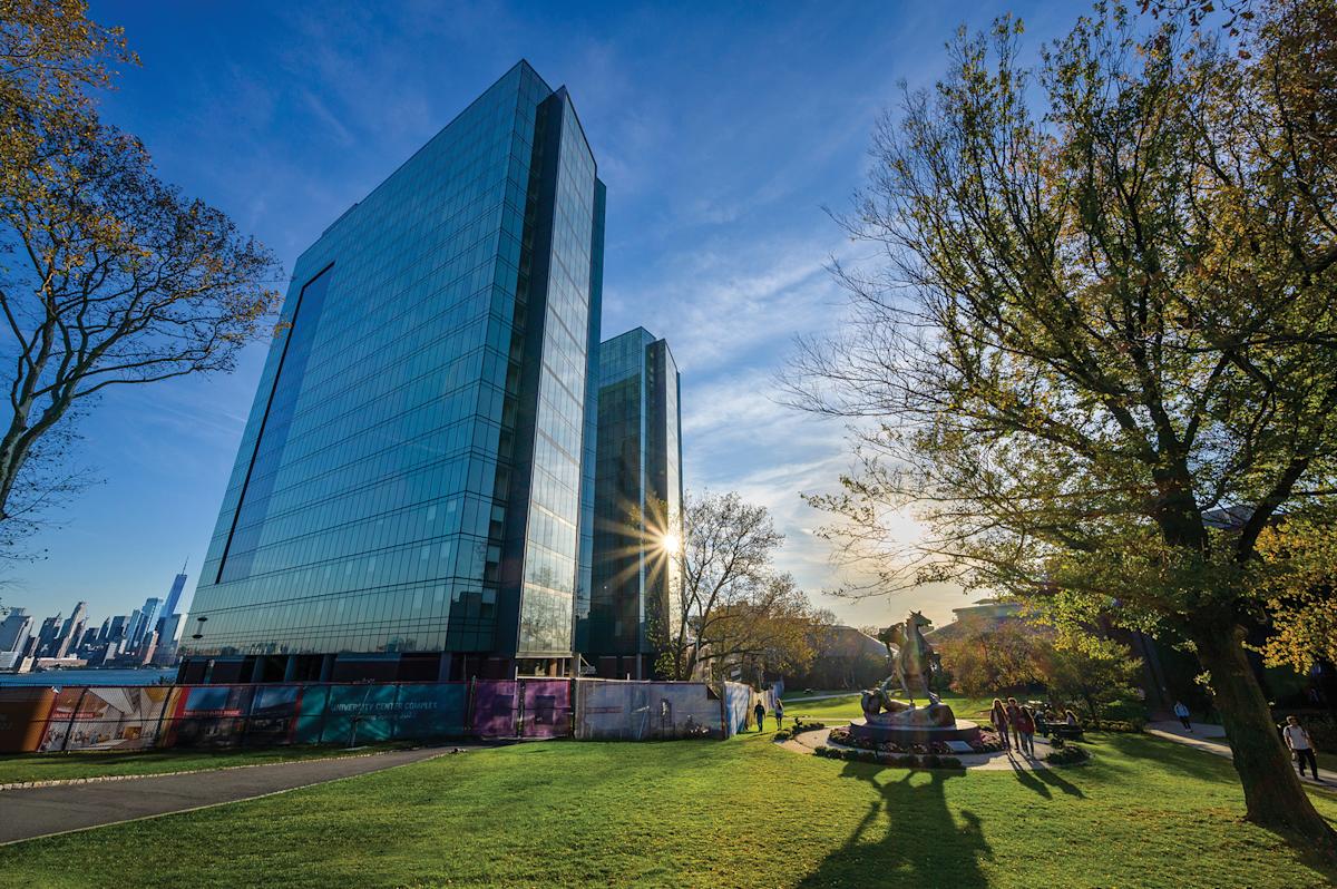 Stevens campus with sun sparkling on University Center.