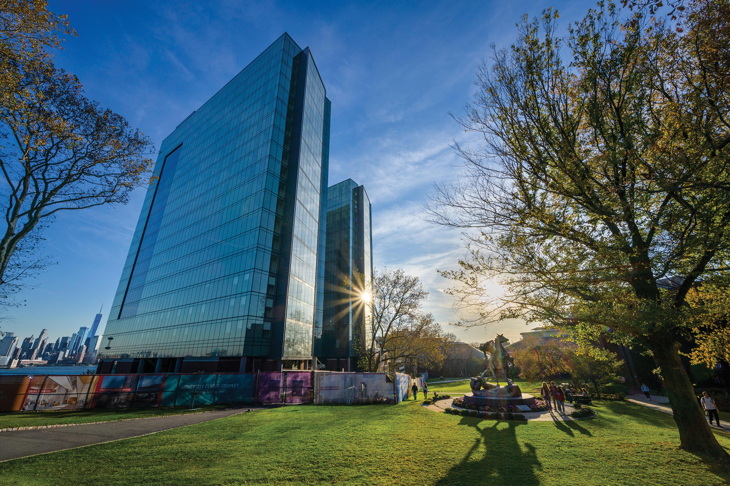 Stevens campus with sun sparkling on University Center.