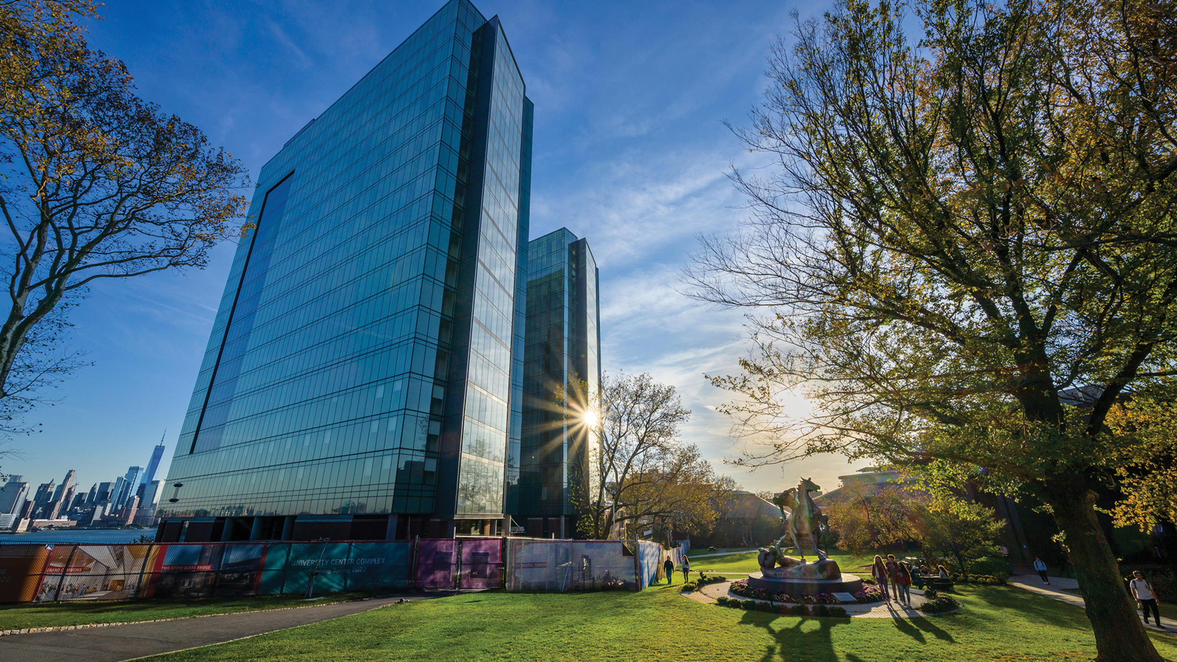 Stevens campus with sun sparkling on University Center.