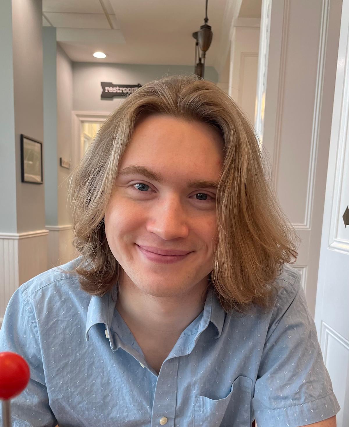 A headshot of a man