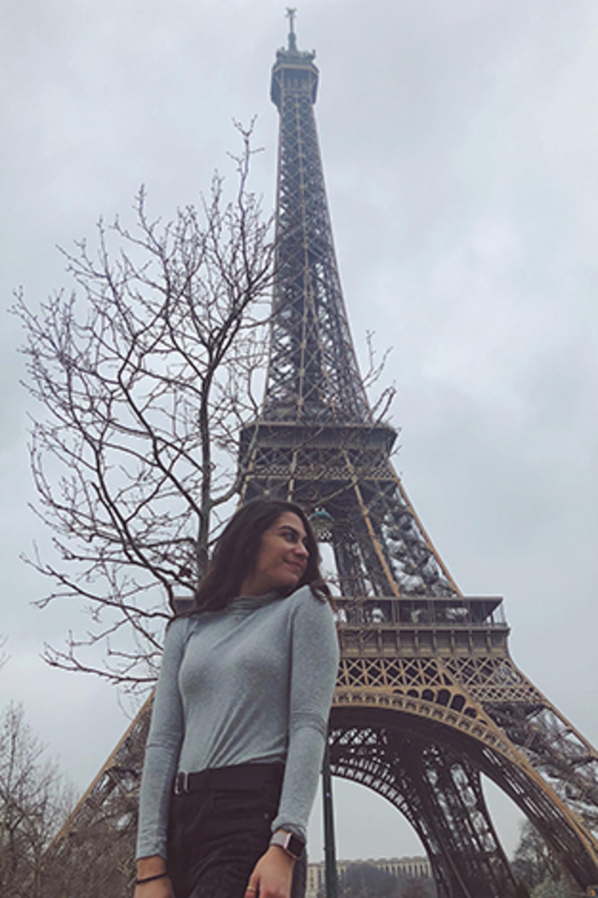 Sheila outside the Eiffel Tower in Paris.