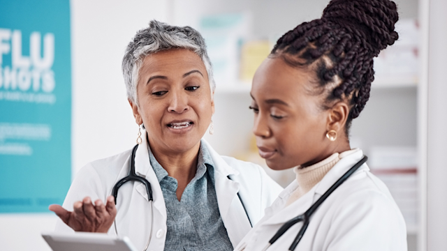 Doctor mentors younger physician