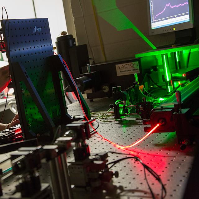 student in laser lab in the Department of Physics