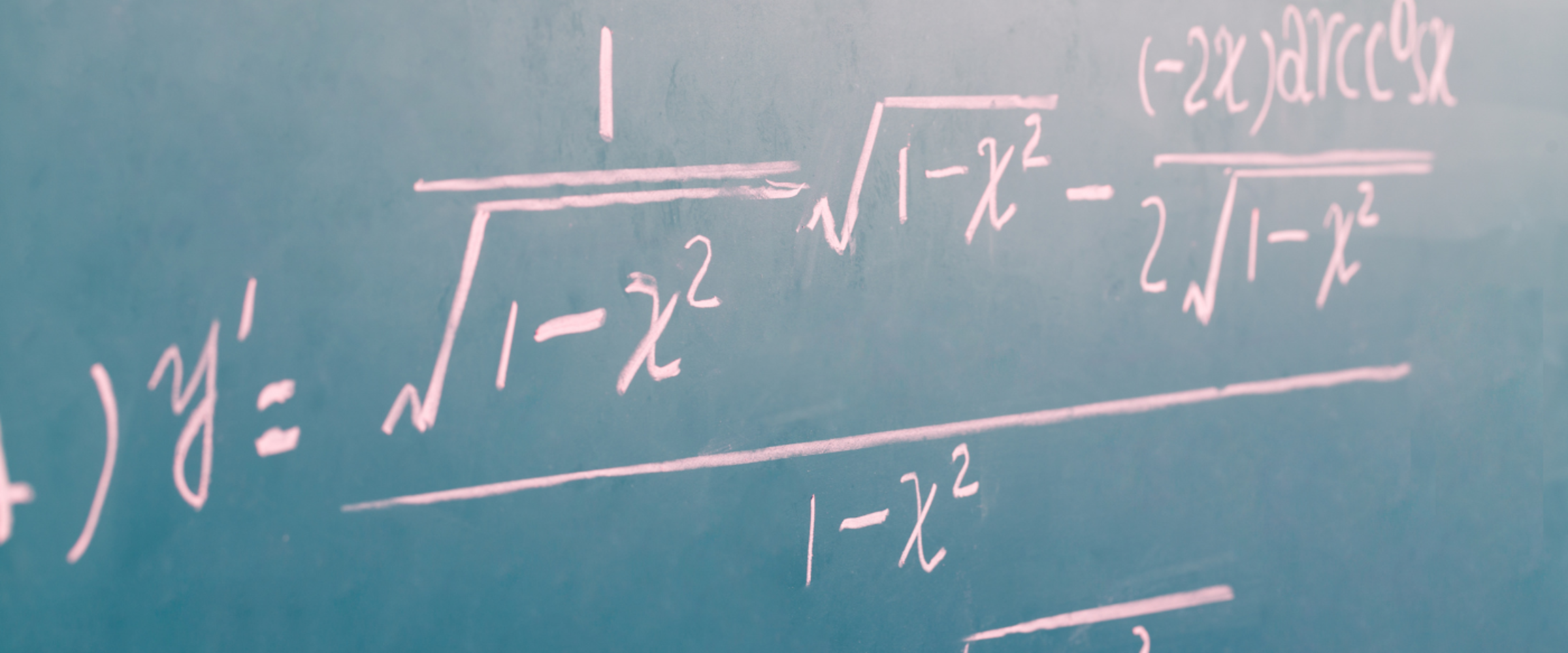 complex math equations written on a chalkboard