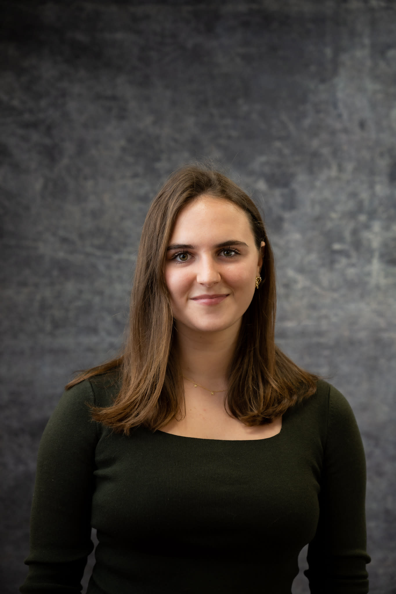 A headshot of a woman