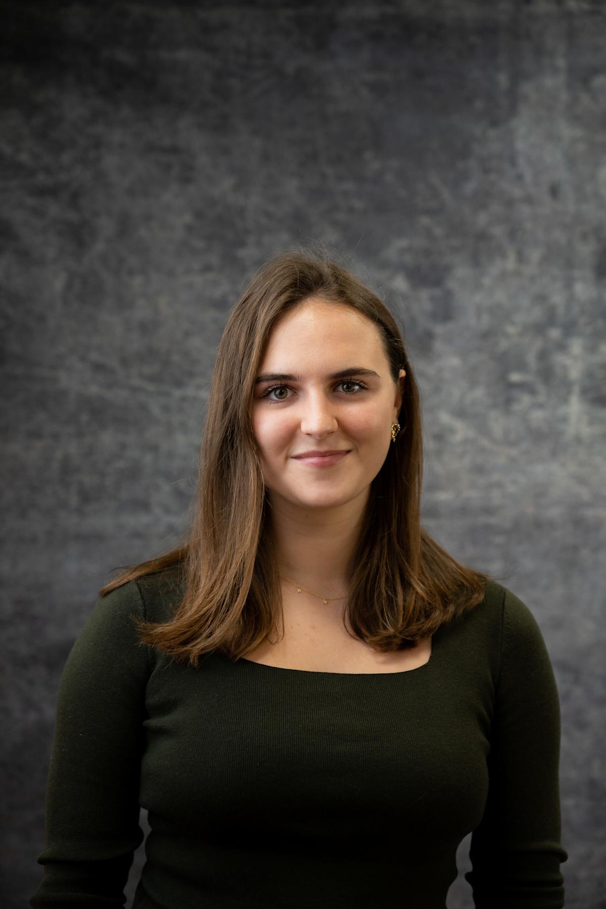 A headshot of a woman