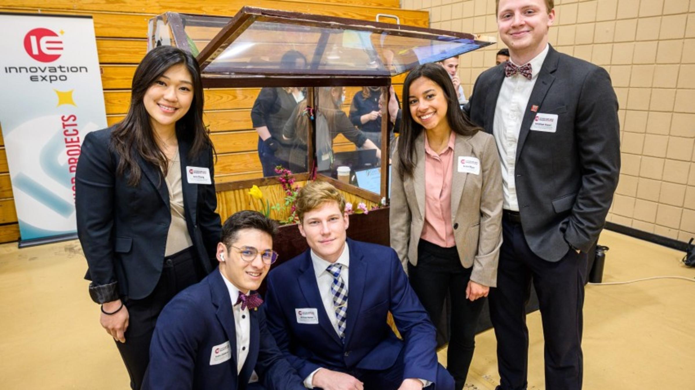 Photo of Stevens Students showing off their project at the Innovation Expo