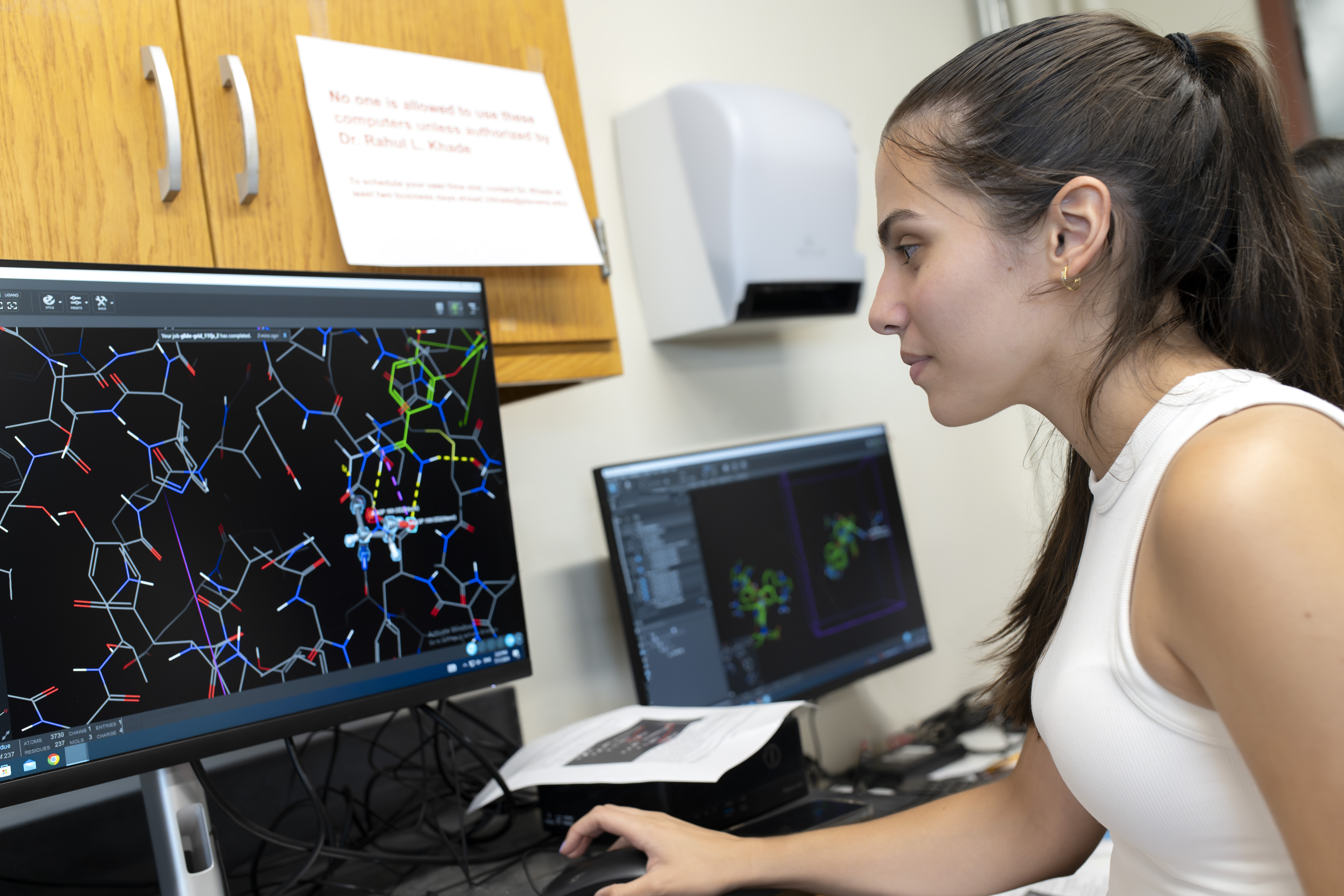 A pre-college student uses a computer 