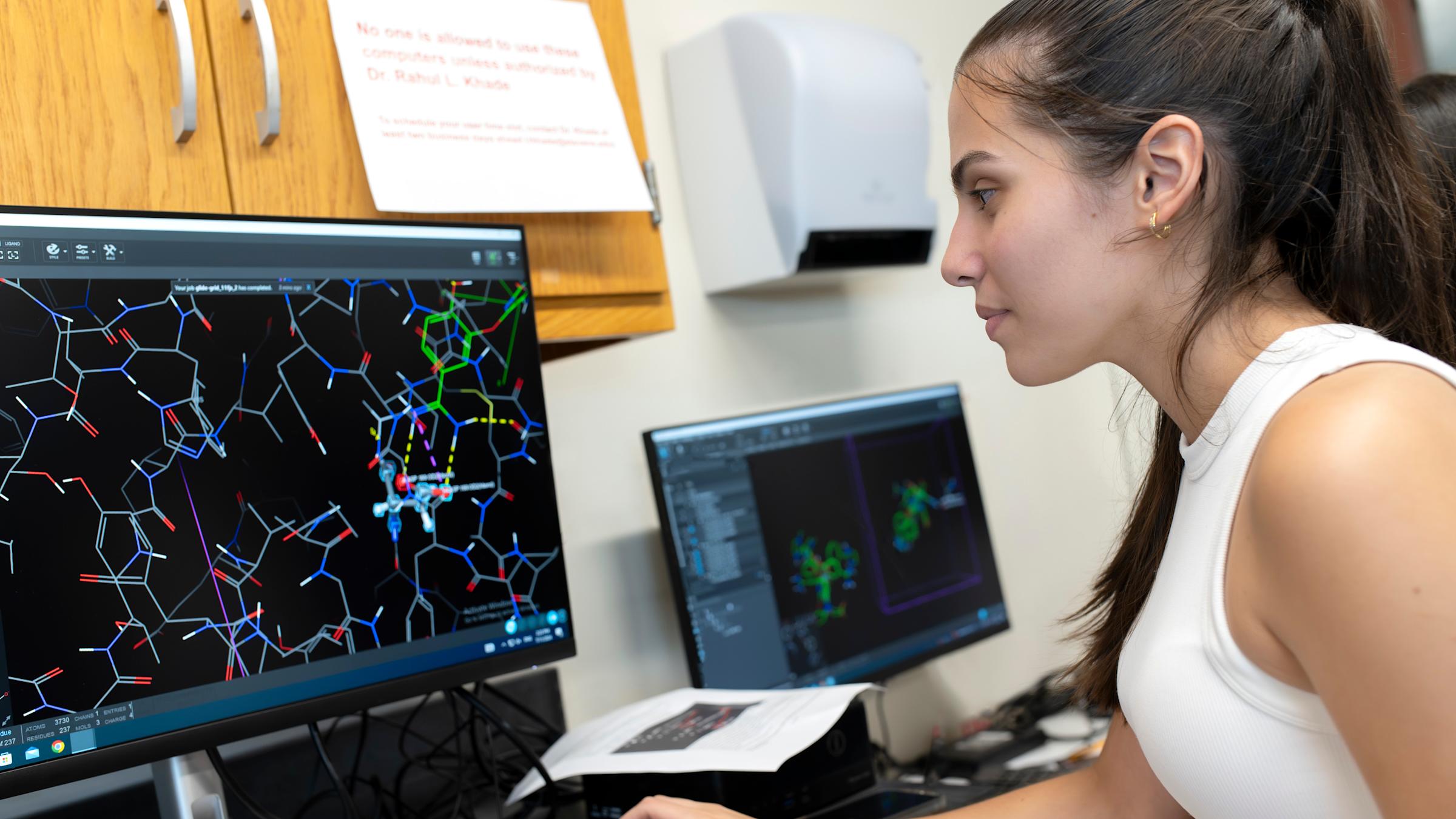 A pre-college student uses a computer