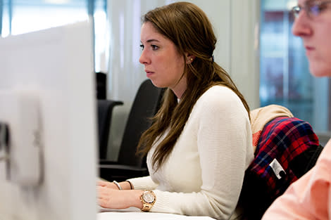 A student working on a computer in lab class