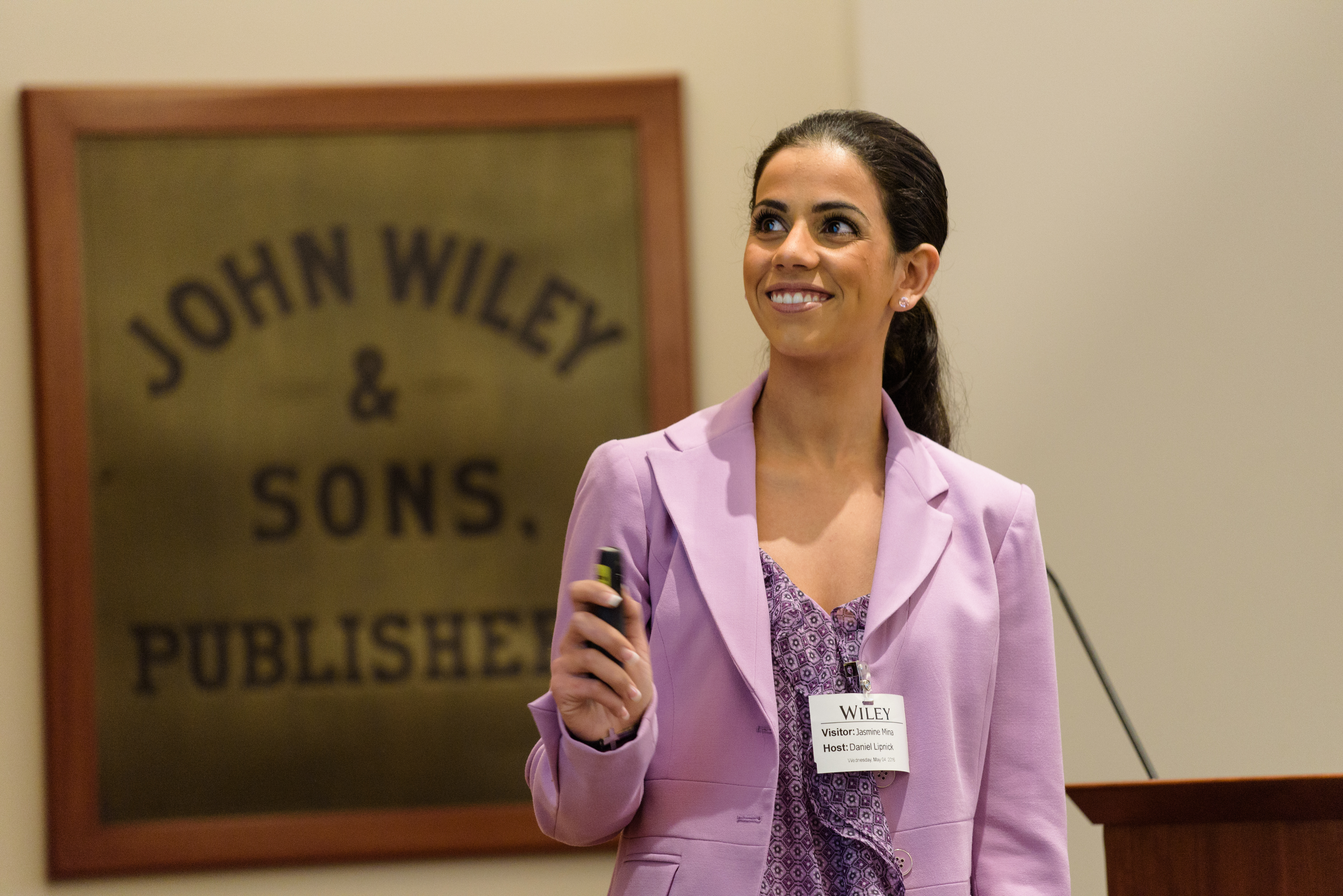 female student in pink blazer