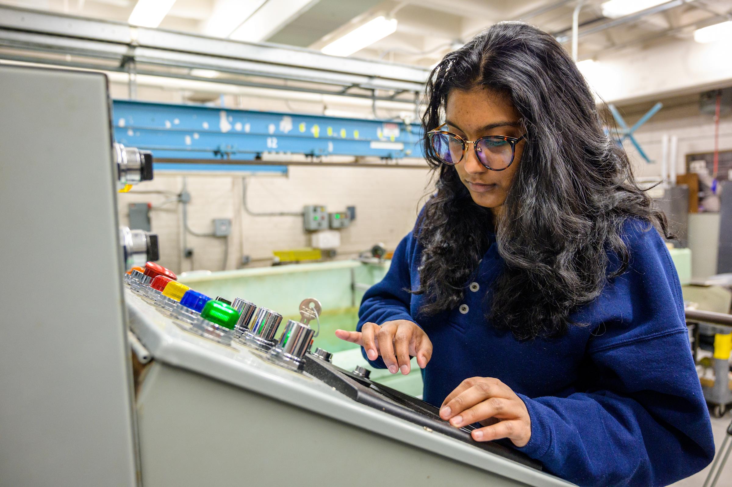 Student operating equipment in the Davidson Lab. 
